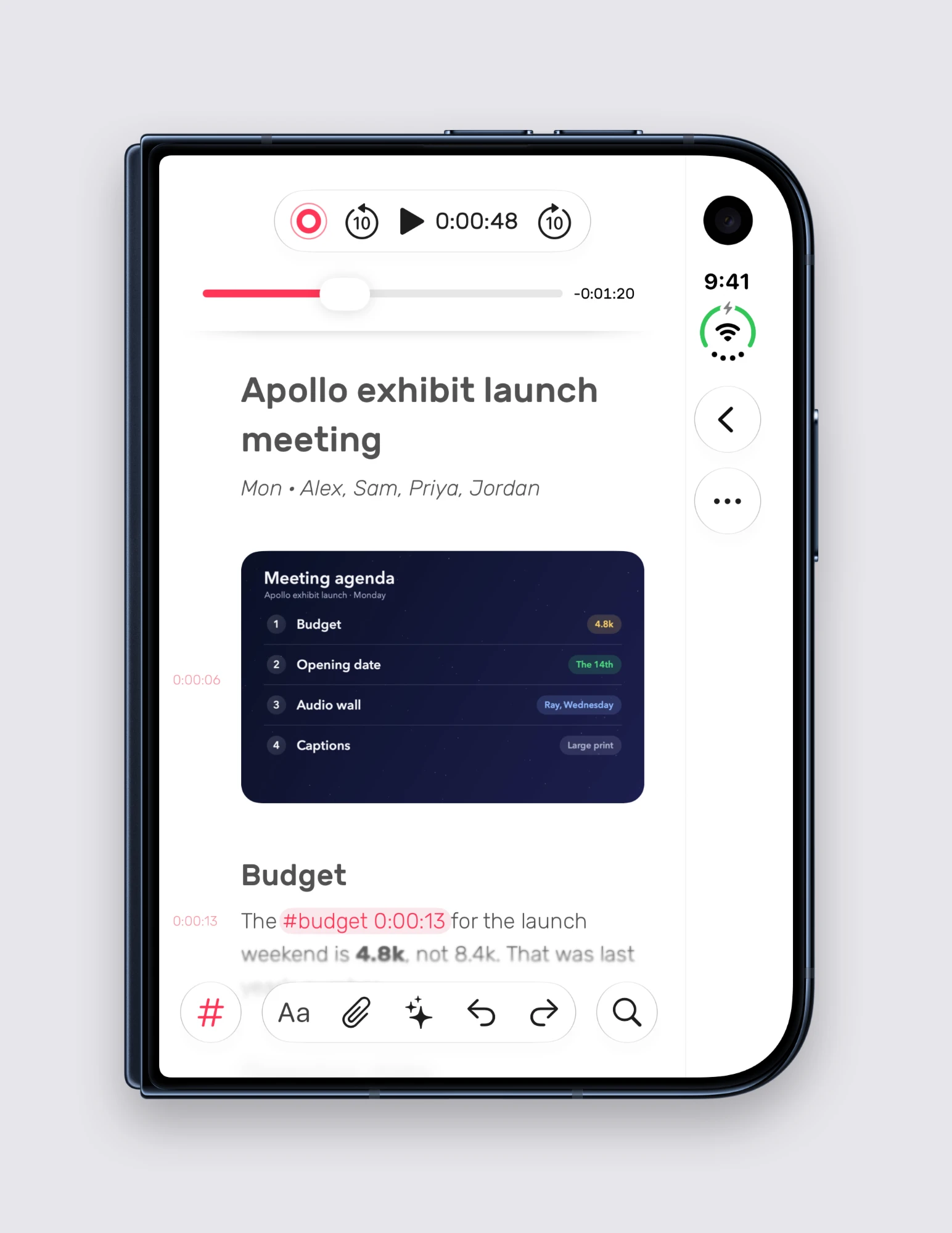 Noted on the outer display of a closed iPhone Duo, showing the Apollo exhibit launch meeting note with the player at the top and the toolbar at the bottom